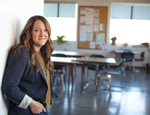 principal with back on wall